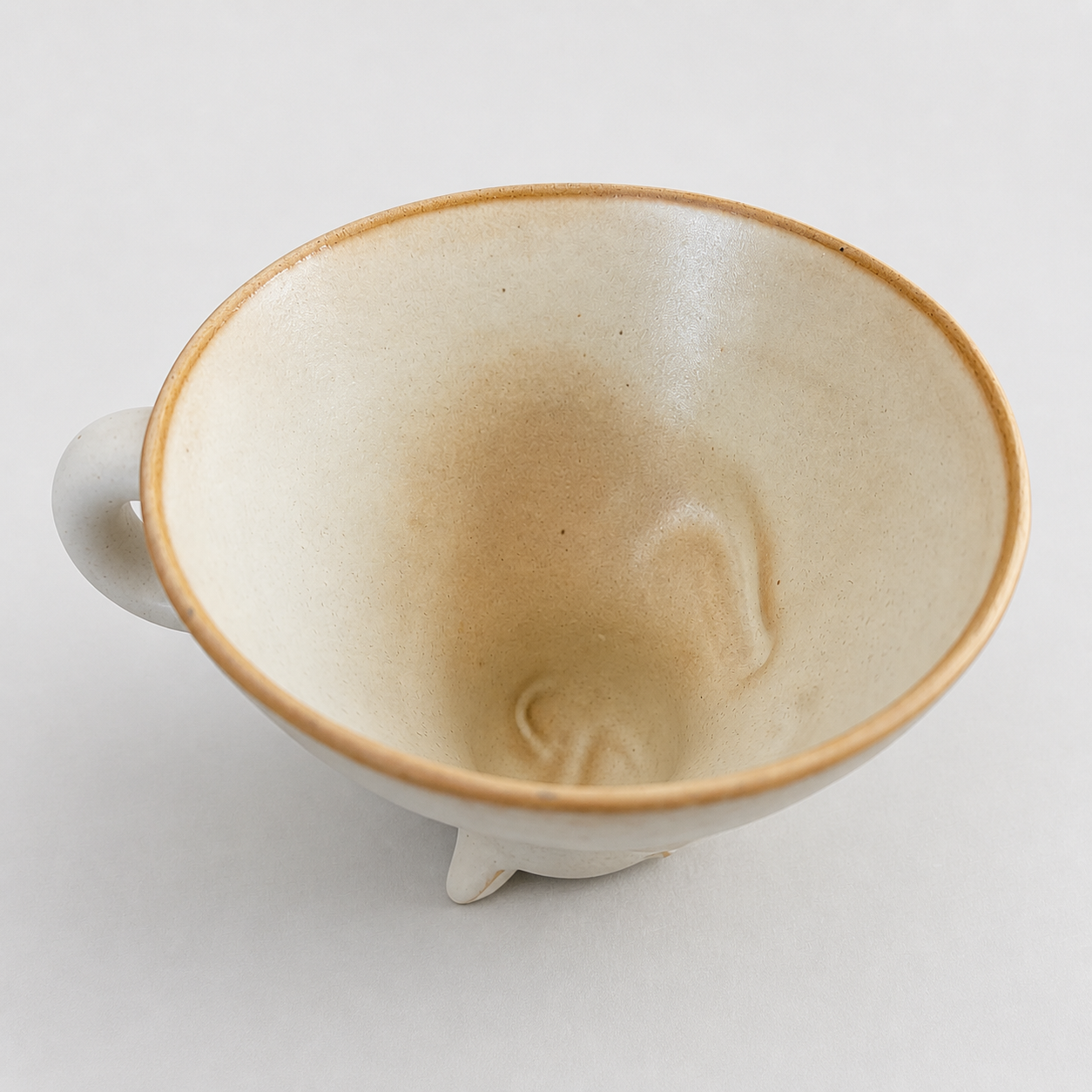 Ivory cat ceramic cup: inside of the cup