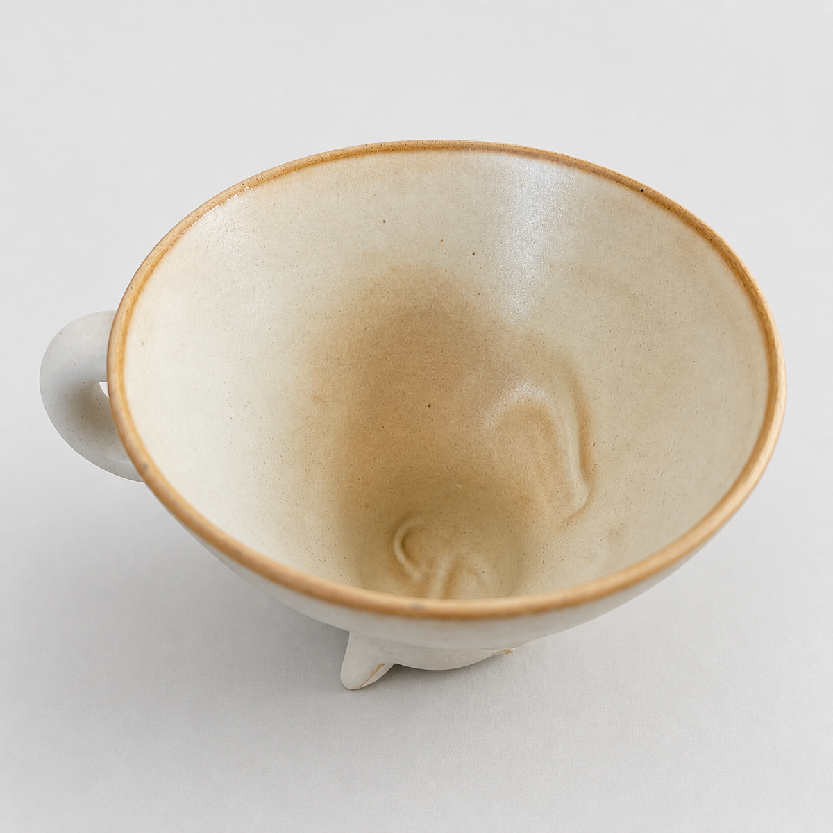 Ivory cat ceramic cup: inside of the cup