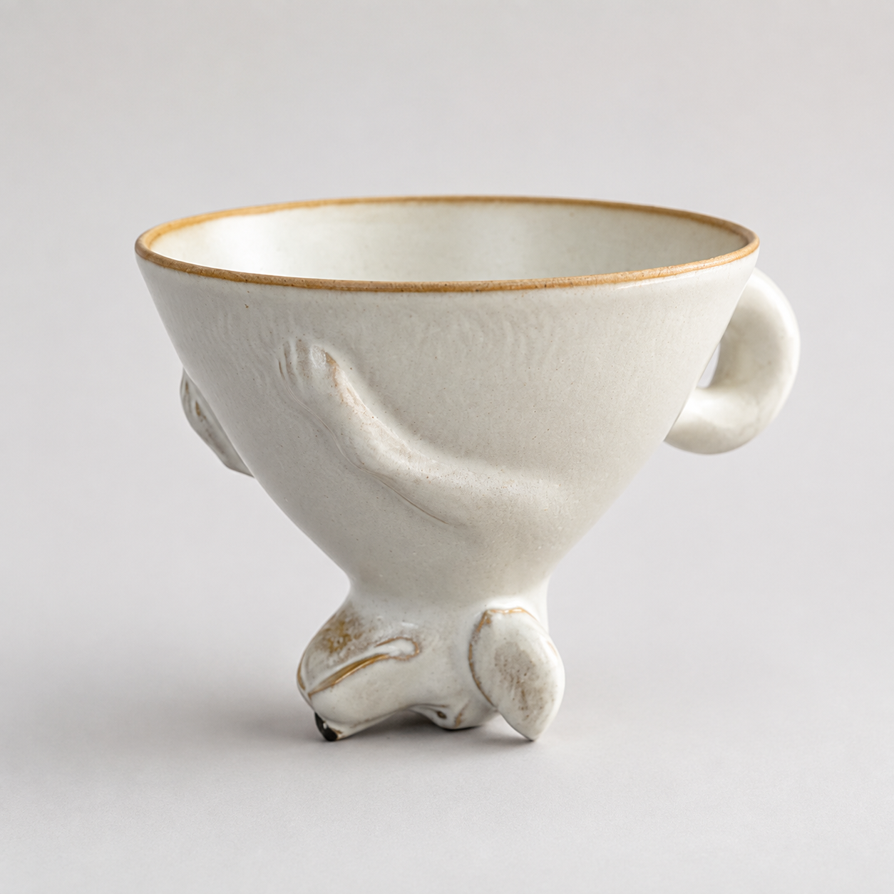 Ivory dog ceramic cup: upright cup and tail handle