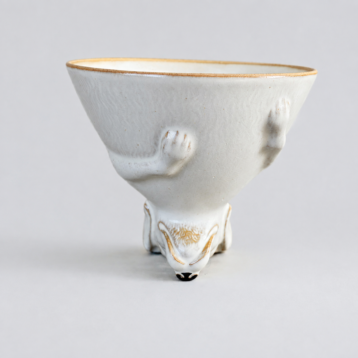 Ivory dog ceramic cup: front with cup opening facing up