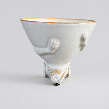 Ivory dog ceramic cup: front with cup opening facing up